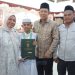 Ribuan Mata Saksikan Momen Haru Wisuda Akbar Darul Arifin, Bupati Muaro Jambi BBS: Pesantren Benteng Moral Generasi Bangsa